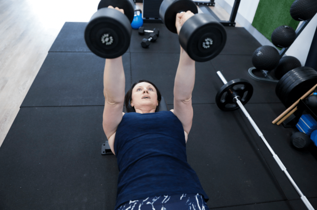 woman exercising with weights