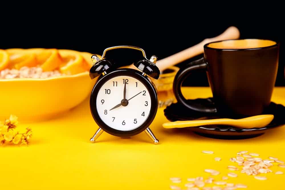 coffee, alarm clock and granola